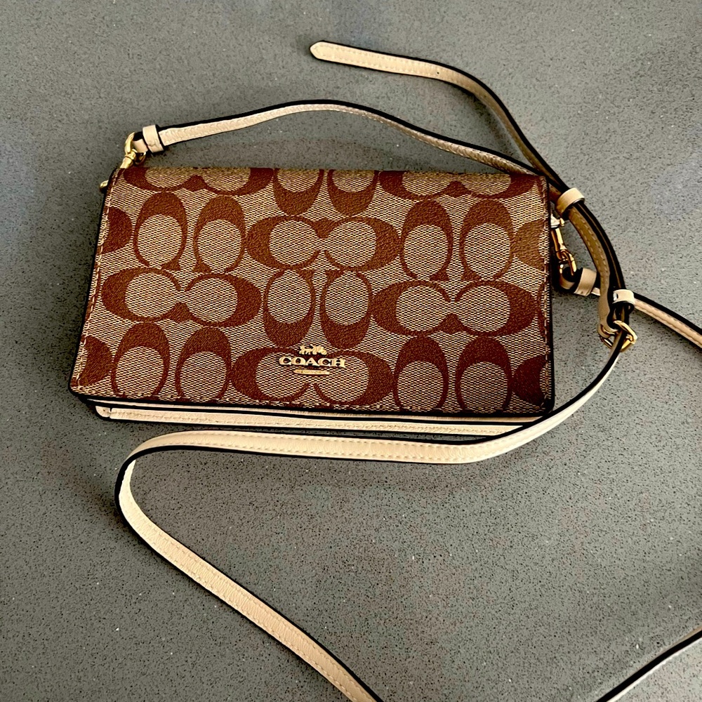 COACH Anna fold over crossbody tan logo coated canvas chalk leather.